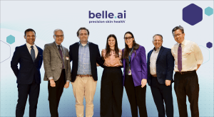 Belle.ai, precision skin health; group photo of smiling staff: Matthew Gloss, Dr. John Romano, Luke Morrissey, Carolyn Privette, staff member, Don Minton, and Ly Tran.